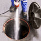 low section man cleaning manhole 85x85